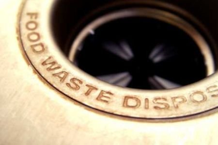 A garbage disposal for food waste.